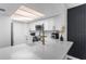 Bright kitchen with white cabinets, modern appliances, and quartz countertops at 2485 Lakeway Branch Dr # 2105, Orlando, FL 32839