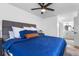 A main bedroom featuring a king bed and an ensuite bathroom at 2485 Lakeway Branch Dr # 2105, Orlando, FL 32839
