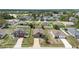 Neighborhood view of well-spaced homes, each with unique features and landscaping at 257 Fig Ct, Kissimmee, FL 34759