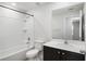Bathroom includes vanity, toilet, and shower/tub combination for convenience at 257 Fig Ct, Kissimmee, FL 34759