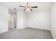 Bedroom with ceiling fan and carpet at 257 Fig Ct, Kissimmee, FL 34759