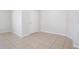 Bright, empty room with neutral walls and tile flooring, ready for personalization at 257 Fig Ct, Kissimmee, FL 34759