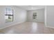 Open space with tile flooring, natural light, and a blank canvas for design at 257 Fig Ct, Kissimmee, FL 34759