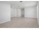 Spacious, neutral-toned living area featuring tile flooring and bright recessed lighting at 257 Fig Ct, Kissimmee, FL 34759