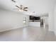 Bright and airy living area with tile flooring and open to kitchen, perfect for entertaining at 257 Fig Ct, Kissimmee, FL 34759