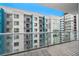 Balcony overlooking modern building with a view of multiple windows and balconies of apartments at 260 S Osceola Ave # 710, Orlando, FL 32801
