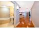 Hallway view of a modern bathroom with a tub and kitchen at 260 S Osceola Ave # 710, Orlando, FL 32801