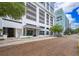 A modern building with street view and brick road in front of the building at 260 S Osceola Ave # 710, Orlando, FL 32801