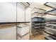 Spacious closet with adjustable metal shelving, designed for customized storage solutions and organization at 260 S Osceola Ave # 710, Orlando, FL 32801