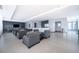 Spacious resident lounge featuring stylish seating arrangements, a wet bar, and a TV for entertainment at 260 S Osceola Ave # 710, Orlando, FL 32801