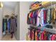 Organized walk-in closet with ample shelving and hanging space for efficient storage and easy access at 2704 Lobelia Dr, Lake Mary, FL 32746