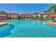 Stunning community pool with ample seating and a well-maintained clubhouse in a serene setting at 2704 Lobelia Dr, Lake Mary, FL 32746