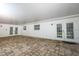 Large screened patio with brick pavers, ceiling, and access to the home and yard at 300 Royal Palm Ct, Longwood, FL 32779