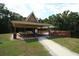 Covered community pavilion with picnic tables and a scenic view at 300 Royal Palm Ct, Longwood, FL 32779