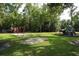 Community playground with swings and climbing equipment for  at 300 Royal Palm Ct, Longwood, FL 32779