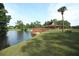 Community pavilion and deck overlooking a serene lake and surrounding nature at 300 Royal Palm Ct, Longwood, FL 32779
