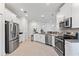 Spacious kitchen boasting stainless steel appliances, generous counter space, and a bright, open layout at 3123 Camden Way, Davenport, FL 33837