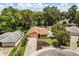 Aerial view showcasing a home with a well-maintained lawn and garden at 3511 Superior Ct, Orlando, FL 32810