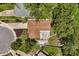 An aerial view showcases a home with backyard patio, lush landscaping, and an inviting outdoor space at 3511 Superior Ct, Orlando, FL 32810