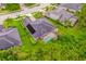 Aerial view of home highlighting solar panels and screened pool at 3753 Heirloom Rose Pl, Oviedo, FL 32766