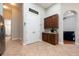 Hallway featuring pantry and direct kitchen access at 3753 Heirloom Rose Pl, Oviedo, FL 32766
