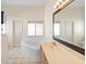 Well-lit bathroom featuring a soaking tub, double sinks, and a large mirror above vanity at 40 Hollow Pine Dr, Debary, FL 32713
