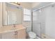 Well-lit bathroom featuring a vanity with ample storage and a walk-in shower at 40 Hollow Pine Dr, Debary, FL 32713