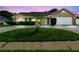 Charming one-story brick home with a manicured lawn and driveway at 40 Hollow Pine Dr, Debary, FL 32713