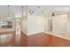 Open-concept living room with hardwood floors and natural light at 40 Hollow Pine Dr, Debary, FL 32713
