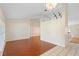 Open-concept living room with hardwood floors and natural light at 40 Hollow Pine Dr, Debary, FL 32713