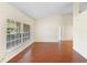 Bright living room featuring tile and hardwood floors at 40 Hollow Pine Dr, Debary, FL 32713