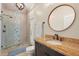 Luxurious bathroom with walk-in shower, soaking tub, and granite vanity at 4221 Isle Vista Ave, Belle Isle, FL 32812