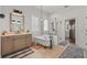 Beautiful bathroom featuring double vanity, soaking tub, and glass-enclosed shower at 4221 Isle Vista Ave, Belle Isle, FL 32812