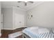 Bedroom with hardwood flooring and a double-door closet at 4221 Isle Vista Ave, Belle Isle, FL 32812