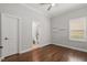 Bedroom with wood flooring and ensuite bathroom at 4221 Isle Vista Ave, Belle Isle, FL 32812