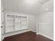 Bonus room featuring dark wood floors and built in shelving at 4221 Isle Vista Ave, Belle Isle, FL 32812