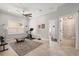 Versatile bonus room features stylish ceiling fan, neutral color palette, and adjacent bathroom at 4221 Isle Vista Ave, Belle Isle, FL 32812