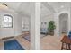 Spacious foyer with decorative rug, light gray walls, and ample natural light at 4221 Isle Vista Ave, Belle Isle, FL 32812