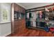 Spacious walk-in closet featuring custom shelving, hanging racks, and drawers for organization at 4221 Isle Vista Ave, Belle Isle, FL 32812