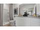 Bathroom featuring a modern vanity, granite counters, double sinks, and a shower at 4618 Linda Dr, Lake Wales, FL 33859