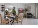 Dining area with a mirror, modern decor, and wood-style table set for dinner at 4618 Linda Dr, Lake Wales, FL 33859