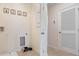 Laundry area with tile flooring, utility sink hookups and washer dryer, plus decorative laundry themed wall art at 4618 Linda Dr, Lake Wales, FL 33859