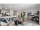Inviting living room featuring an open layout, kitchen bar, and elegant decor at 4618 Linda Dr, Lake Wales, FL 33859