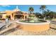 Beautiful view of the community clubhouse with fountain, 'Regal Palms Bar-Restaurant-Spa' signage at 487 La Mirage St, Davenport, FL 33897