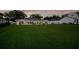 Wide backyard with lush green grass at 49 Interlaken Rd, Orlando, FL 32804