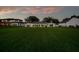 Large backyard with lush green grass and patio at 49 Interlaken Rd, Orlando, FL 32804