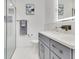 Modern bathroom featuring a sleek vanity, stylish fixtures, a glass-enclosed shower, and contemporary design, offering a spa-like retreat at 49 Interlaken Rd, Orlando, FL 32804