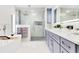 Luxurious bathroom featuring a soaking tub and walk-in shower at 49 Interlaken Rd, Orlando, FL 32804