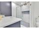 Bathroom showcasing a sleek vanity, elegant fixtures, and a glass-enclosed shower, offering a luxurious and stylish experience at 49 Interlaken Rd, Orlando, FL 32804