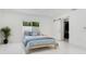 Clean bedroom with a sliding barn door closet at 49 Interlaken Rd, Orlando, FL 32804